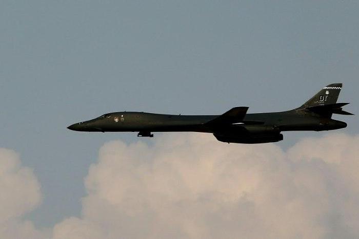 A US B1-B bomber and two F-15 fighters with the Japan Air Self-Defense Force flew over the neighbouring East China Sea, the US Pacific Air Forces Public Affairs office said