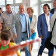 Russian President Vladimir Putin (C) visits a youth holiday facility outside Yalta, Crimea, which was denounced by Kiev as violating its sovereignty
