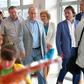 Russian President Vladimir Putin (C) visits a youth holiday facility outside Yalta, Crimea, which was denounced by Kiev as violating its sovereignty