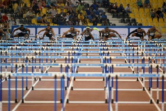 Sprinters compete in the 110m hurdles event of the Diamond League athletics meeting, at the Suhaim bin Hamad Stadium in Doha, in May 2016