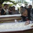 Luis Carlos de Oliveira, 49, mourns his relatives Ana Cristina da Conceicao, 42, and her mother, Marlene Maria da Conceicao, 76, killed by stray bullets during a firefight between police and traffickers in the Mangueira shantytown, in Rio de Janeiro in...