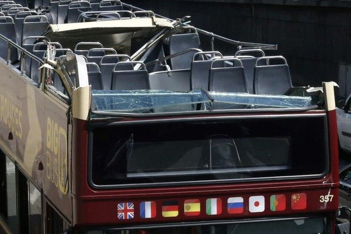A woman was seriously injured when a bus scraped the roof of a tunnel under the Alexandre III bridge in Paris