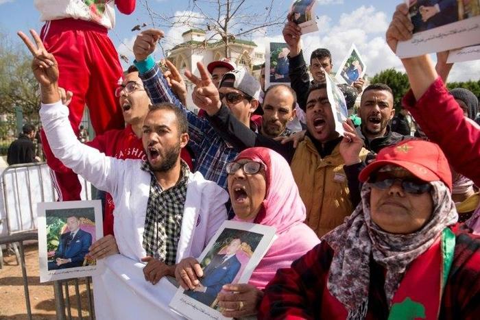 Moroccans demonstrate outside a court on March 13, 2017 against the killing of security forces in the Western Sahara in 2010