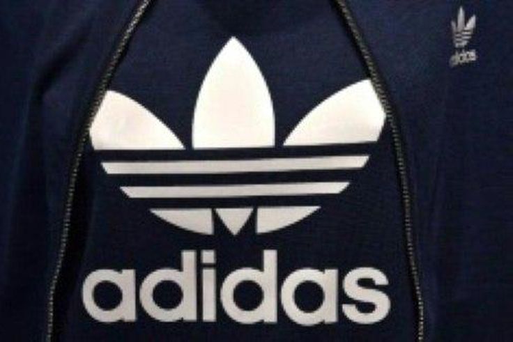 German sporting goods maker Adidas says net profit sprinted ahead by 30 percent in the first quarter