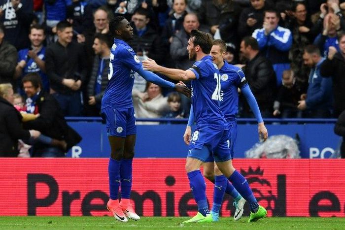 Leicester City's Wilfred Ndidi (L) celebrates scoring their opening goal against Stoke City at King Power Stadium in Leicester, central England on April 1, 2017