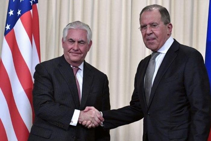 Russian Foreign Minister Sergei Lavrov (R) shakes hands with US Secretary of State Rex Tillerson after a press conference in Moscow on April 12, 2017