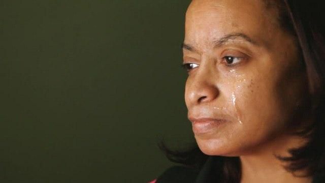 This crying woman needs help urgently