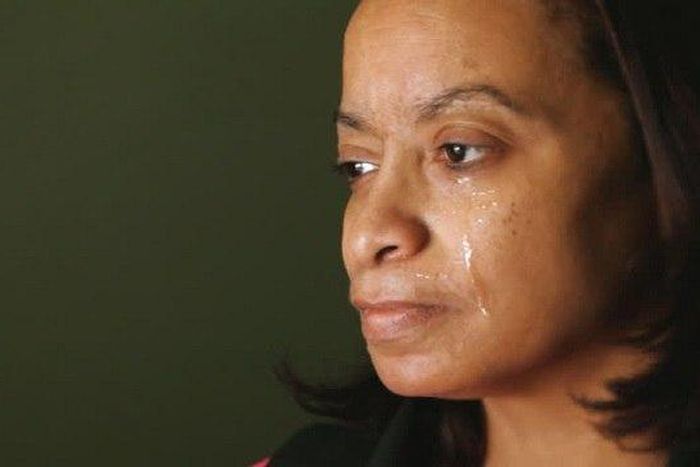 This crying woman needs help urgently