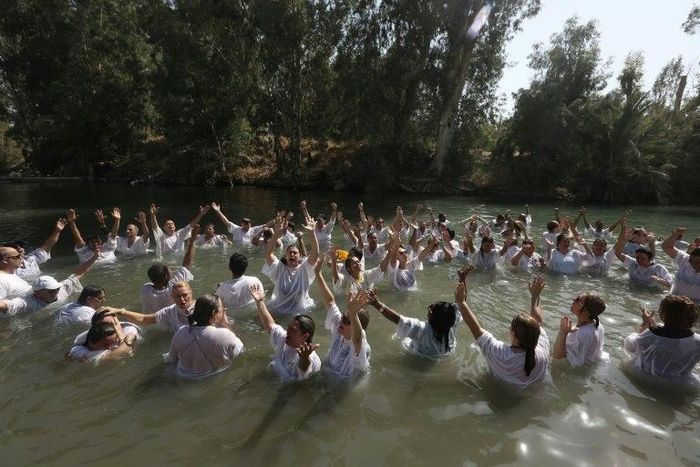 Christians believe Jesus was baptized in the Jordan River by John the Baptist, and many visit the site to take part in mass baptism ceremonies, such as these Brazilian pilgrims in 2016