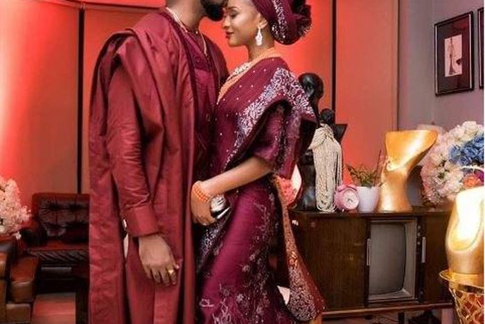 Banky W kisses Adesua's forehead