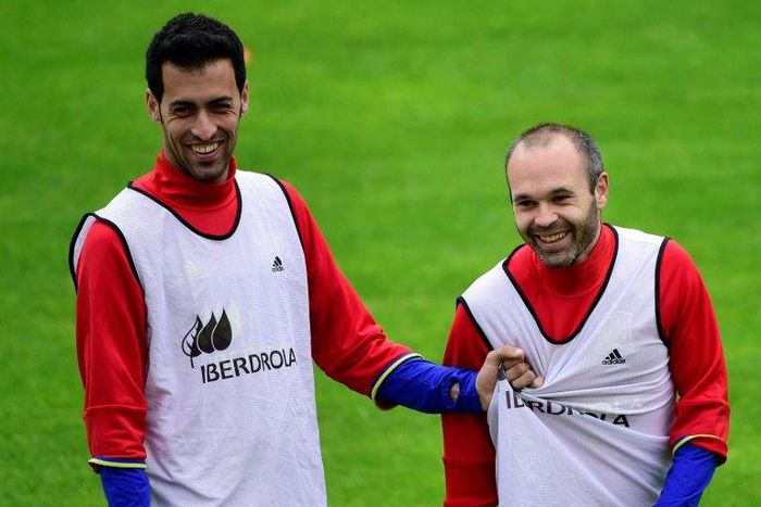 Midfielders Sergio Busquets (left) and Andres Iniesta will be missing for Barcelona when the club take on Atletico Madrid in the Copa del Rey semi-final