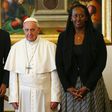 Pope Francis (centre) poses with Rwanda's President Paul Kagame and his wife Jeannette Kagame ahead of a meeting at the Vatican March 20, 2017