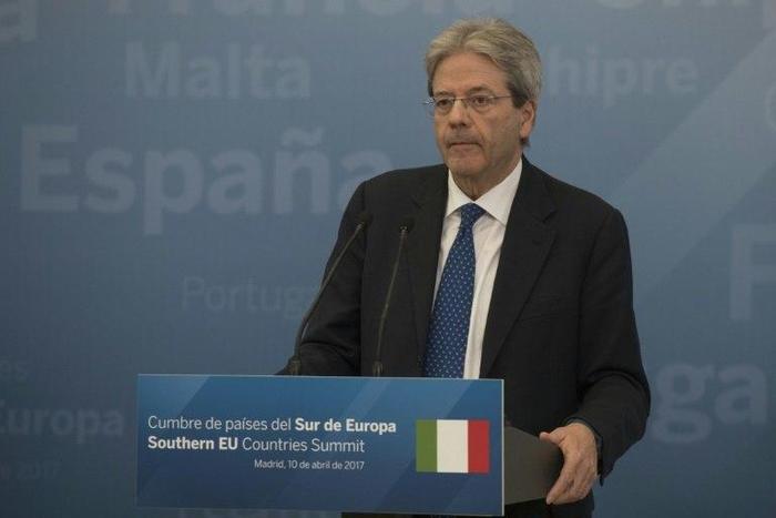 Italian Prime Minister Paolo Gentiloni speaks during a press conference on April 10, 2017 at the Palacio del Pardo, near the Spanish capital Madrid, following a summit of southern European Union countries