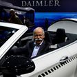 CEO of German carmaker Daimler and Mercedes-Benz, Dieter Zetsche, poses inside a Mercedes-AMG C 63 Cabriolet ahead of the annual shareholders meeting in Berlin, on March 29, 2017