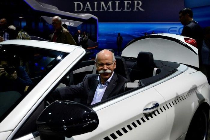 CEO of German carmaker Daimler and Mercedes-Benz, Dieter Zetsche, poses inside a Mercedes-AMG C 63 Cabriolet ahead of the annual shareholders meeting in Berlin, on March 29, 2017
