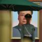 A paramilitary police officer stands guard in front of the portrait of Mao Zedong in Tiananmen Square. Flamboyant real estate tycoon Guo Wengui is waging a one-man guerrilla war against China's elite with explosive accusations of corruption