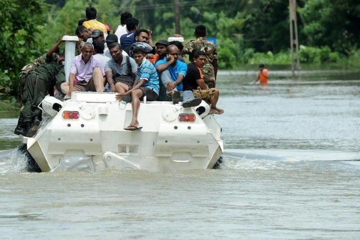 Sri Lanka's monsoon death toll has climbed to 164 in the island's worst flooding in 14 years