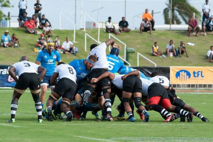 Fiji's and Italy's players take part in a scrum during their international rugby union Test match in Suva, on June 17, 2017