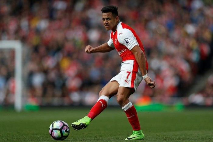 Arsenal's striker Alexis Sanchez passes the ball during the English Premier League football match against Manchester City April 2, 2017