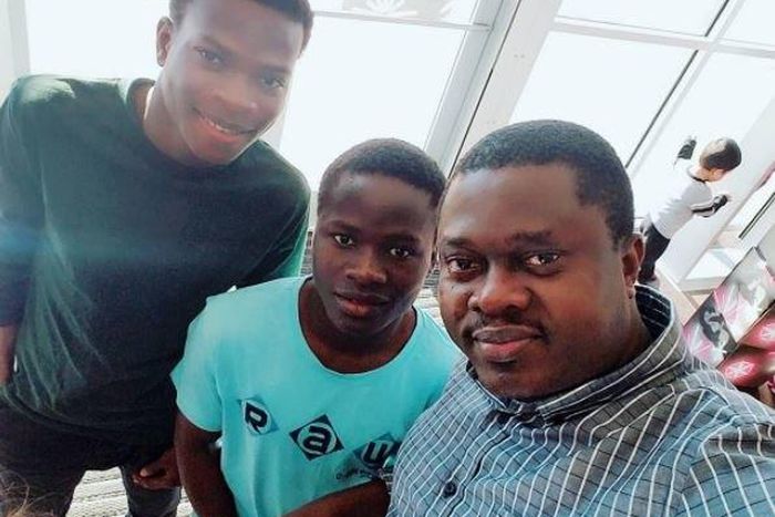 Muyiwa Ademol and son, Taiwo and Kehinde