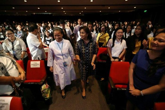 Philippine Vice President Leni Robredo (C) has called for international scrutiny on the nation's drug war