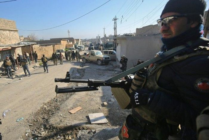 Iraqi forces are deployed in the village of al-Buseif, south of Mosul, during an offensive to retake the western side of the city from Islamic State (IS) group fighters on February 21, 2017