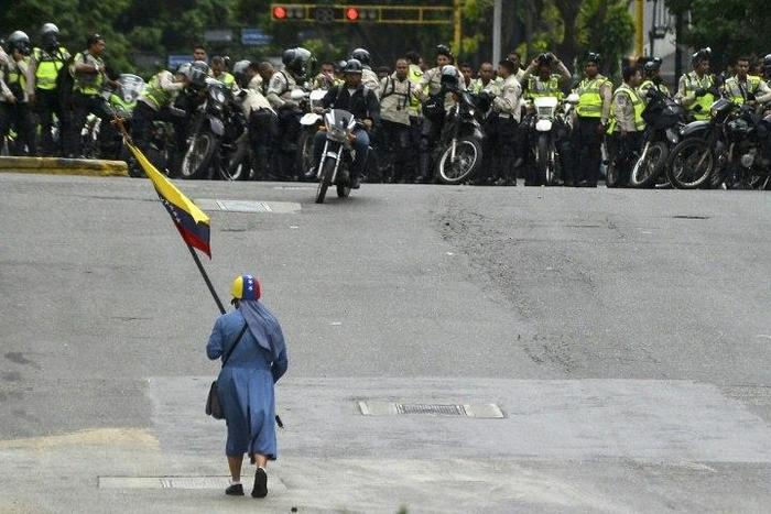 Venezuelan security forces are accused of running over, attacking and robbing protesters and journalists