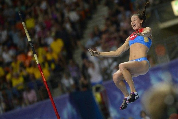 Russia's Yelena Isinbayeva celebrates as she clears the bar during the women's pole vault final at the 2013 IAAF World Championships at the Luzhniki stadium in Moscow on August 13, 2013
