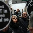 Crowds in Istanbul hold placards reading 'We all are Hrant, we all are Armenians" on January 19, 2017, to mark the 10th anniversary of the killing of Turkish-Armenian journalist Hrant Dink
