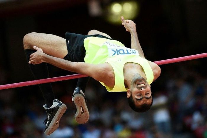 Syrian high jumper Majd Eddin Ghazal competes at the 2015 IAAF World Championships in Beijing