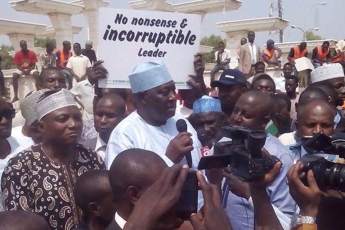 Babachir Lawal and Garba Shehu addressing Nigerians in Abuja