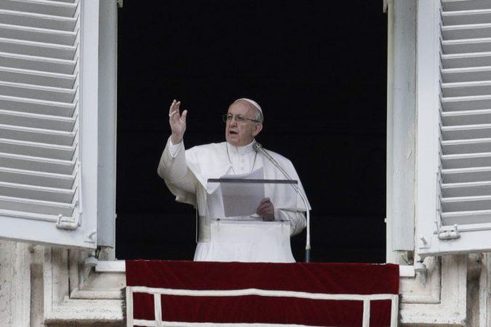 Pope Francis says he may consider making married men priests