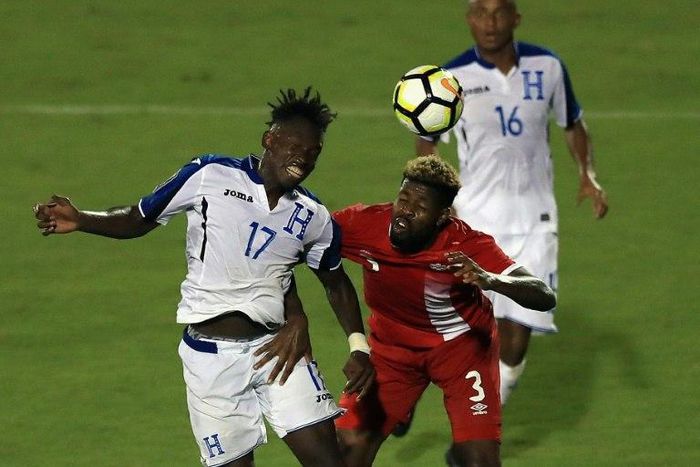 Alberth Elis #17 of Honduras and Manjrekar James #3 of Canada play during the 2017 CONCACAF Gold Cup at Toyota Stadium
