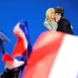 France's incoming president Emmanuel Macron kisses his wife Brigitte after his victory in the first round of the election in April