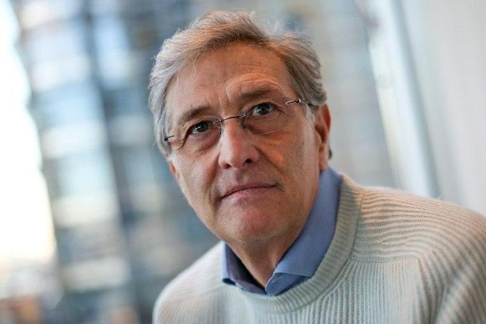 Director of the European Medicines Agency (EMA), Italian Guido Rasi, poses for a photo at the organisation's headquarters at Canary Wharf in east London on January 20, 2017