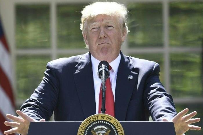 President Donald Trump announced Thursday the US would immediately stop implementing the "bad" Paris climate deal brokered by his predecessor Barack Obama in 2015 in tandem with Chinese leaders