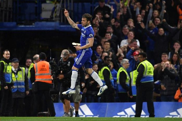 Chelsea's midfielder Cesc Fabregas celebrates scoring their fourth goal on May 15, 2017