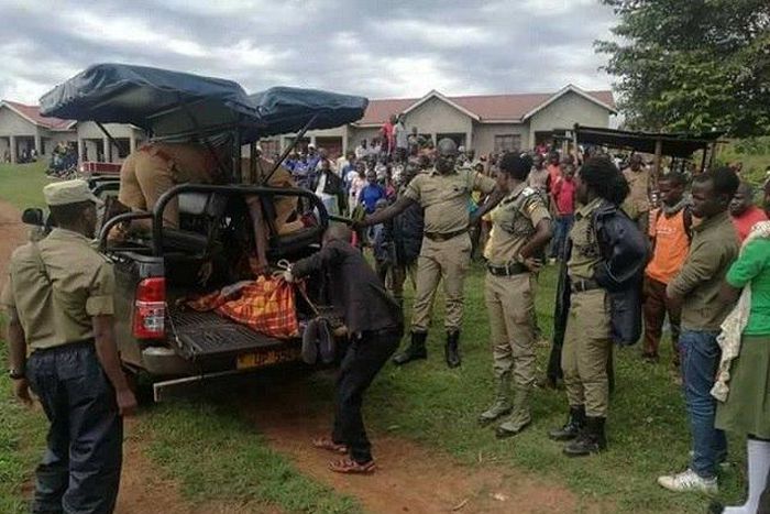 The body of the deceased being taken away