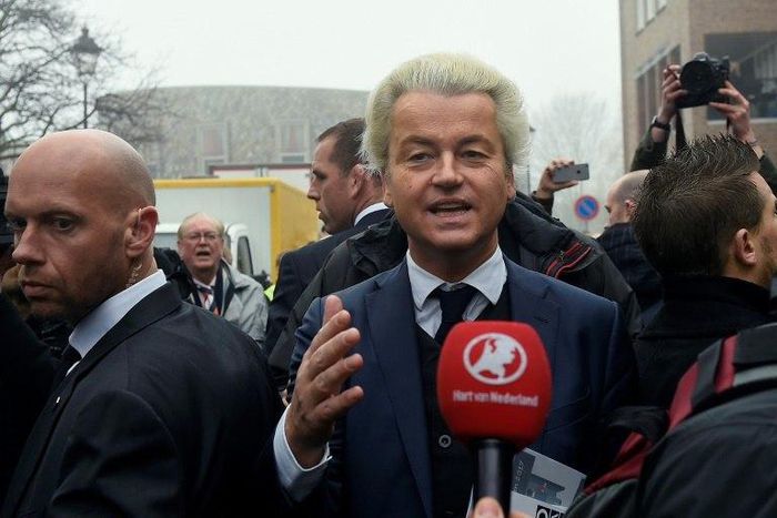 Dutch far-right Freedom Party leader (Partij Voor De Vrijheid - PVV) Geert Wilders (C) speaks to journalists as he officially launches his parliamentary election campaign in Spijkenisse on February 18, 2017