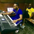 Kcee and Harry song in the studio.