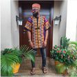 Noble Igwe gives a pop of colour to his outfit with a tribal kimono