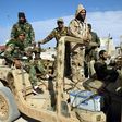 Members of the Libyan National Army (LNA), also known as the forces loyal to Marshal Khalifa Haftar, patrol the area of Qanfudah, on the southern outskirts of Benghazi