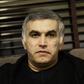 (FILES) In this file photo taken on November 2, 2014 top Bahraini human rights activist Nabeel Rajab sits at his home in the village of Bani Jamrah, west of Manama