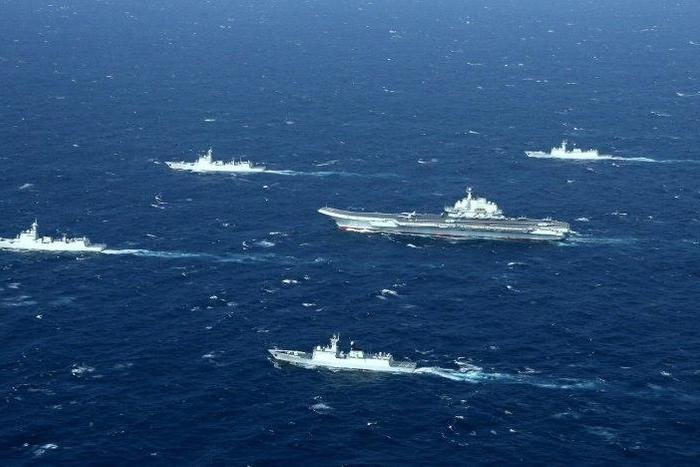 A Chinese navy formation, including the aircraft carrier Liaoning (C), during military drills in the South China Sea on January 2, 2017
