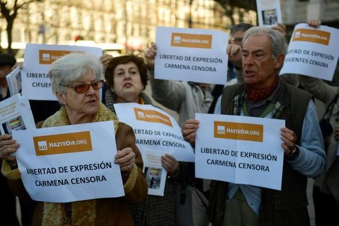 Members of the "HazteOir" ("Make yourself heard") association protest in Madrid on March 1, 2017 against the immobilisation by the police of their anti-transgender propaganda bus