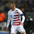 Christian Pulisic is an American international {Chelsea}