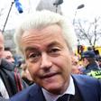 Dutch far-right politician and leader of the Partij Voor De Vrijheid (PVV or Freedom Party) Geert Wilders is surrounded by security and supporters as he officially launches his parliamentary election campaign in Spijkenisse on February 18, 2017. Firebr...