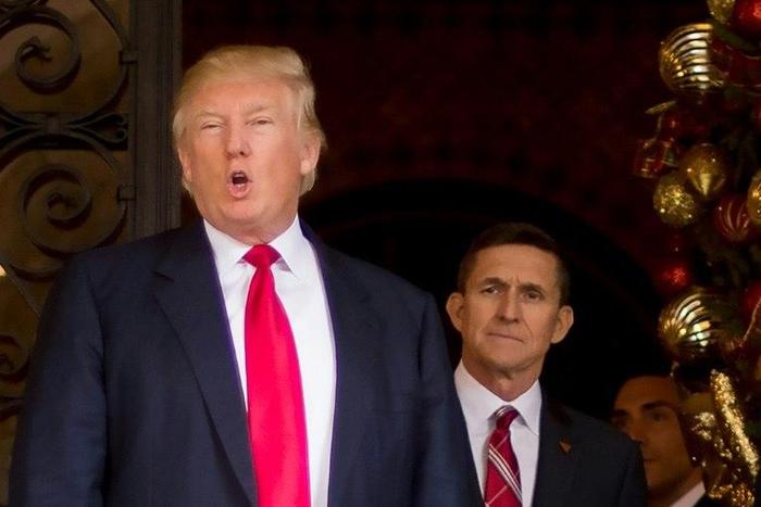 Former national security advisor Michael Flynn, seen here with Donald Trump in December 2016 before he assumed the presidency, is the subject of a Pentagon investigation over payments he received from foreign governments