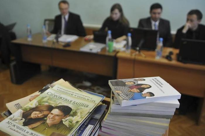 Stacks of booklets distributed by Jehovah's Witnesses in a Russian court.