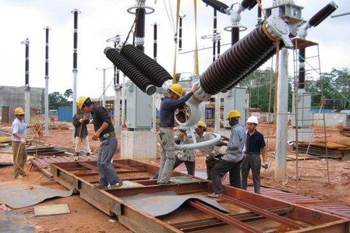 Workers on an electricity site